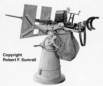 A left hand view of the ubiquitous single 20-mm Mark 4 gun mount which was the U.S. Navy's standard light anti-aircraft machine gun during World War II. The heavy cast pedestal housed an elevating screw, which allowed the height of the gun to be adjusted.